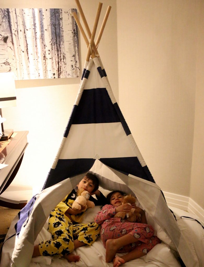 Sleeping in this fabulous Teepee... My husband moved them to their bed later that night.